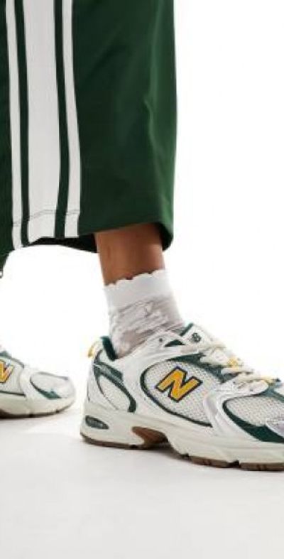 New Balance 530 collegiate sneakers in white green and gold