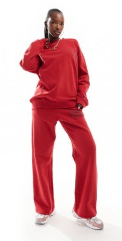 The Frolic The Frolic exclusive Cherry Bomb wide leg sweatpants in red - part of a set