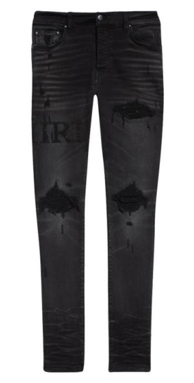 AMIRI Bouclé Logo Ripped MX1 Skinny Jeans in Faded Black at