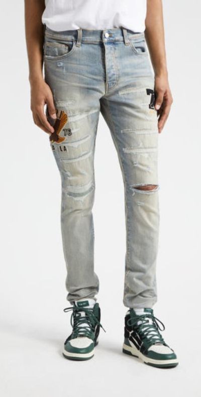 AMIRI Varsity Eagle Logo Ripped Skinny Jeans in Antique Indigo