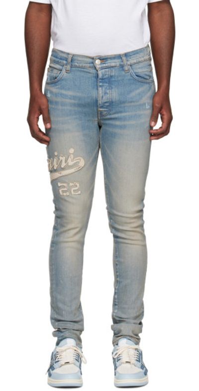 AMIRI Indigo Varsity Appliqué Jeans