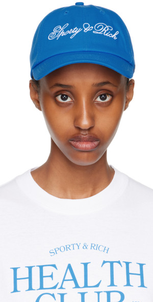 キャップ SPORTY & RICH CURSIVE LOGO HAT BLUE SPORTY & RICH Cursive logo cap - Blue | Garmentory