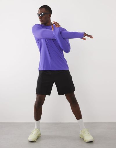 4505 4505 7" woven training shorts with elastic waist band and zip pockets in black