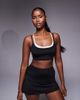 4505 4505 Padel active double layer light support sports bra in black and white - 1