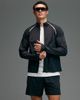 4505 4505 Premium woven water repellent running jacket with zip pockets and reflective detailing in void black - 1