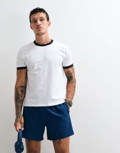 4505 4505 shrunken muscle fit cotton ringer baby tee with quick dry finish in white