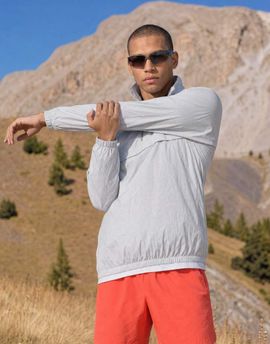 4505 4505 ultra lightweight water repellent 1/4 zip running windbreaker with front pocket in silver