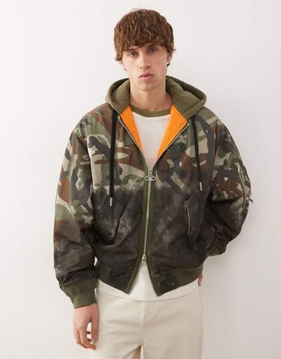 AAPE BY A BATHING APE® Aape by A Bathing Ape heavyweight hooded bomber jacket in dark camo print-Multi