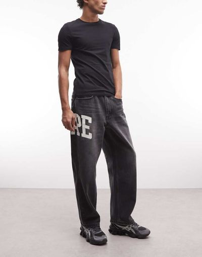 AAPE BY A BATHING APE® Aape by A Bathing Ape loose fit denim jeans in washed black with logo print