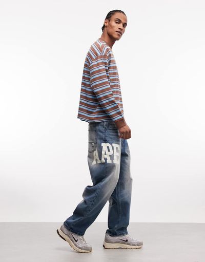AAPE BY A BATHING APE® Aape by A Bathing Ape loose fit denim jeans in washed blue with logo print