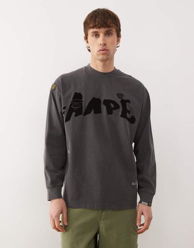 AAPE BY A BATHING APE® Aape By A Bathing Ape oversized long sleeve T-shirt in washed black with graffiti print