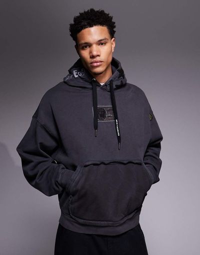 AAPE BY A BATHING APE® Aape by A Bathing Ape oversized pullover hoodie in black garment dye