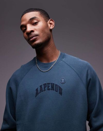 AAPE BY A BATHING APE® Aape by A Bathing Ape printed logo sweatshirt in dark green-Black