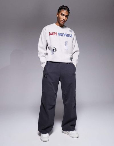 AAPE BY A BATHING APE® Aape by A Bathing Ape x Erased loose fit heavyweight jersey sweatpants in washed black