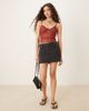 Abercrombie & Fitch Abercrombie & Fitch low rise denim mini skort in black - 1