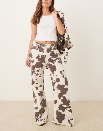 Abercrombie & Fitch Abercrombie & Fitch mid rise baggy bootcut jeans in multi cow print