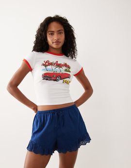 Abercrombie & Fitch Abercrombie & Fitch pull on shorts with eyelet ruffle hem in navy
