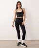 Abercrombie & Fitch Abercrombie & Fitch YPB sculptlux sports bra with white stitching in black - 3