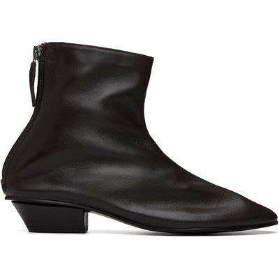 About Arianne About Arianne Brown Mica Boots