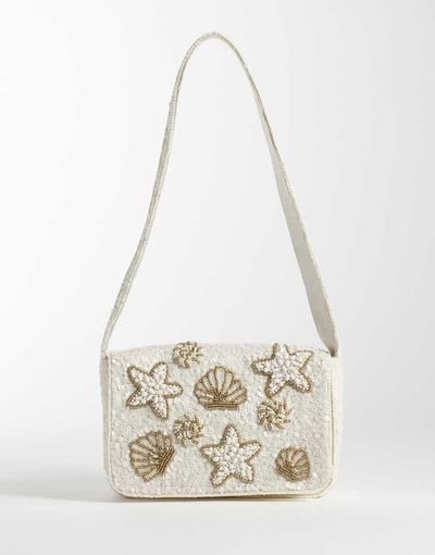 Accessorize Accessorize embellished shell shoulder bag in cream-White
