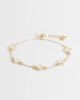 Accessorize Accessorize faux pearl toggle clover bracelet in gold - 1
