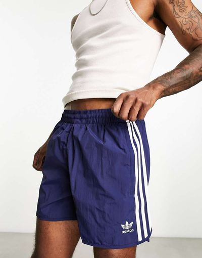 adidas Originals adidas Originals adicolor three stripe 5 inch sprinter shorts in navy