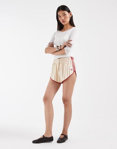 adidas Originals adidas Originals Firebird pinstripe shorts in warm vanilla and red-Neutral
