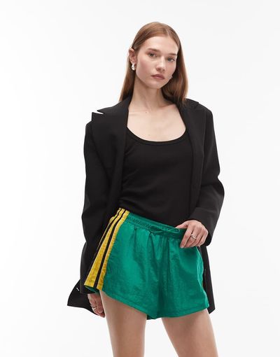 adidas Originals adidas Originals Santigao shorts in green with yellow detail