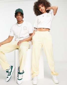 adidas Originals adidas Originals 'Sports Resort' three stripe wide leg track pants in yellow