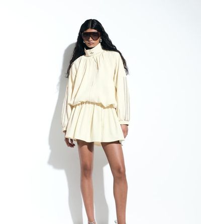 adidas Originals x ASOS adidas Originals x ASOS pleated skort in buttermilk-Yellow