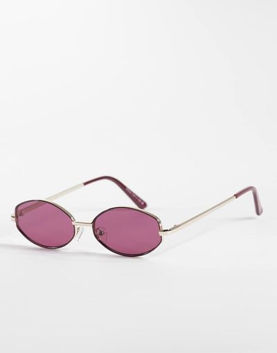 Aire AIRE objective slim oval metal sunglasses in gold with burgundy lens