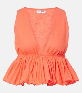 Alaia AlaÃ¯a Peplum striped cotton and linen top