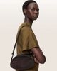 AllSaints AllSaints Rosalie Arc suede leather crossbody bag in dark brown - 1