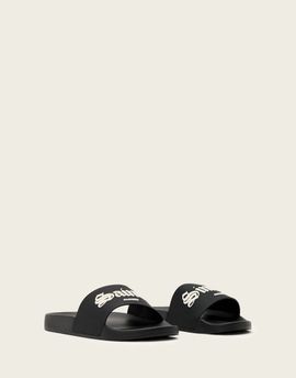 AllSaints AllSaints Saints & Sinners logo slides in black