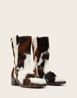 AllSaints AllSaints terri cow print mid length boots in cream-Multi