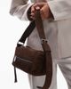 AllSaints Allsaints Vega suede mini shoulder bag in brown - 4