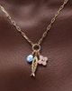 Ana Luisa Ana Luisa Flora Charm Necklace Charm Necklace in Gold, Women's at Urban Outfitters - 1