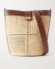 ANYA HINDMARCH Leather-trimmed raffia crossbody bag - 1