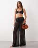 Aray Aray semi-sheer beach pants in black - 1