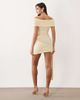 Aria Cove Aria Cove bouclé knit twisted off the shoulder and knotted drape front mini dress in yellow - 2