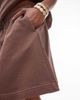 Arket ARKET soft touch elasticized waist mini skirt in brown - 4