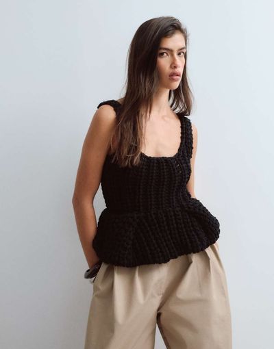 ARRANGE ARRANGE chunky hand knit peplum top in black