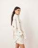 ARRANGE ARRANGE cotton mirrored floral embroidered cutwork shorts in white - part of a set - 4
