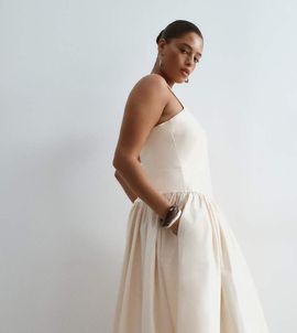 ARRANGE ARRANGE Curve premium waisted dress with puffball hem in ecru-White
