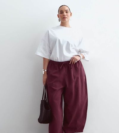 ARRANGE ARRANGE Curve Willa elastic waist drawstring pants in washed burgundy-Red