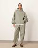 ARRANGE ARRANGE oversized premium heavy weight cuffed sweatpants in olive green - 1