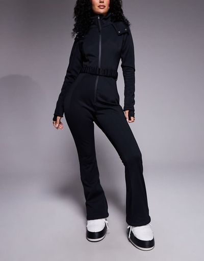 ASOS 4505 Ski & Snow ASOS 4505 Hourglass Ski soft shell belted ski suit with slim kick leg and faux fur hood in black