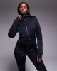 ASOS 4505 Ski & Snow ASOS 4505 Ski soft shell belted ski suit with skinny legs and faux fur hood in black - 4