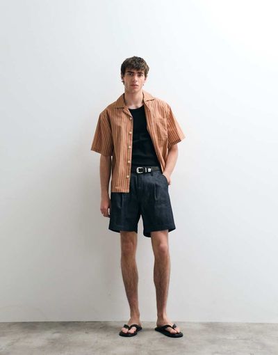 ASOS COLLECTIVE ASOS COLLECTIVE pleated denim shorts in indigo-Navy