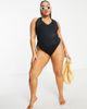 ASOS Curve ASOS DESIGN Curve adjustable leg halter swimsuit in black - 2